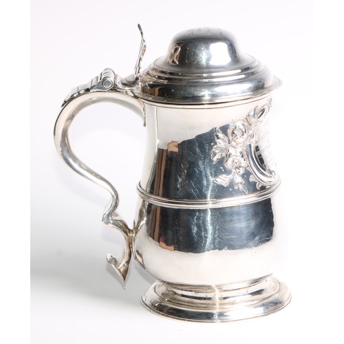 913 - A George III silver baluster tankard, hinged domed cover, chair-back thumbpiece, double-scroll handl... 