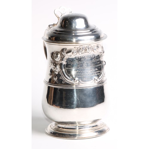 913 - A George III silver baluster tankard, hinged domed cover, chair-back thumbpiece, double-scroll handl... 