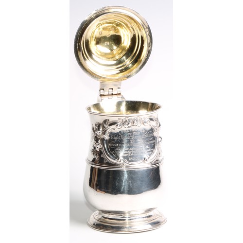 913 - A George III silver baluster tankard, hinged domed cover, chair-back thumbpiece, double-scroll handl... 