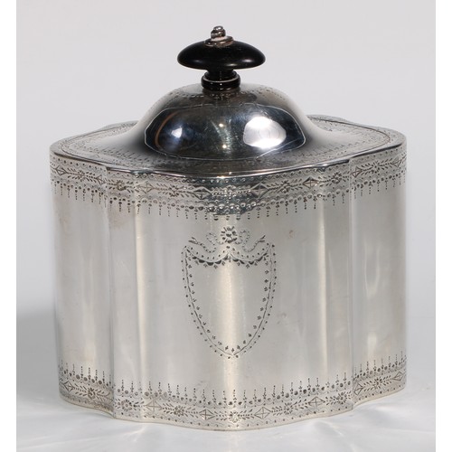 920 - A George III silver commode shaped tea caddy, bright-cut and wrigglework engraved, hinged domed cove... 