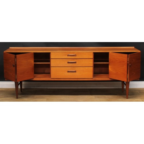 2070 - Mid-century Design - a teak sideboard, by Nathan, rectangular top with shallow half-gallery above th... 