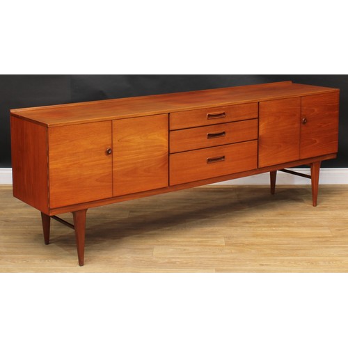 2070 - Mid-century Design - a teak sideboard, by Nathan, rectangular top with shallow half-gallery above th... 