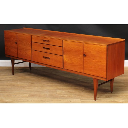 2070 - Mid-century Design - a teak sideboard, by Nathan, rectangular top with shallow half-gallery above th... 