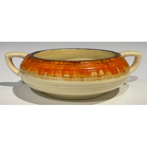 8 - A Clarice Cliff Bizarre Rodanthe pattern compressed circular ribbed two handled bowl, 25cm across ha... 