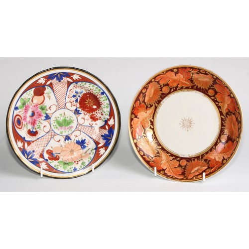 268 - A Pinxton circular plate, pattern number 342, decorated in the Imari palette with panels of stylised... 