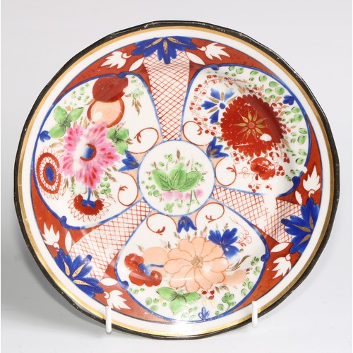 268 - A Pinxton circular plate, pattern number 342, decorated in the Imari palette with panels of stylised... 