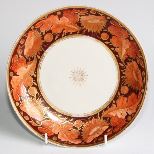 268 - A Pinxton circular plate, pattern number 342, decorated in the Imari palette with panels of stylised... 