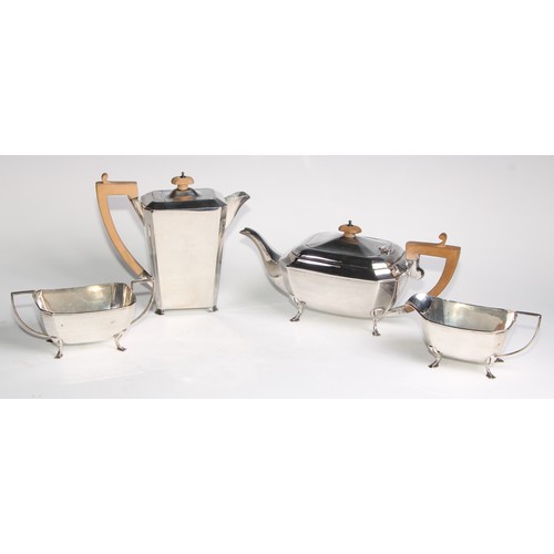 952 - A George V Art silver Art Deco four piece tea service, angular handles, pad feet, Cooper Brothers & ... 