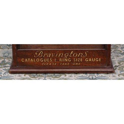 6179 - Advertising, Jewellery Interest - a mahogany shaped rectangular brochure display stand, with three s... 