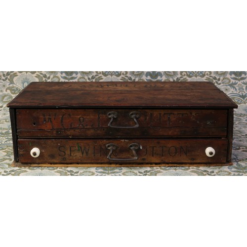 6186 - Advertising - a late 19th century rectangular shaped table top haberdashery chest, comprising two lo... 