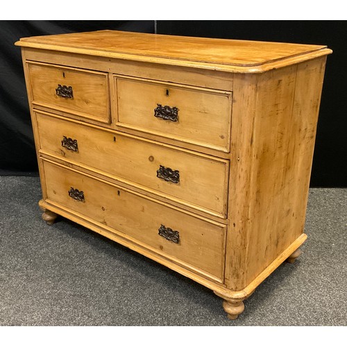 97 - A Victorian pine chest of drawers, two short over two graduated long drawers, brass swan-neck handle... 