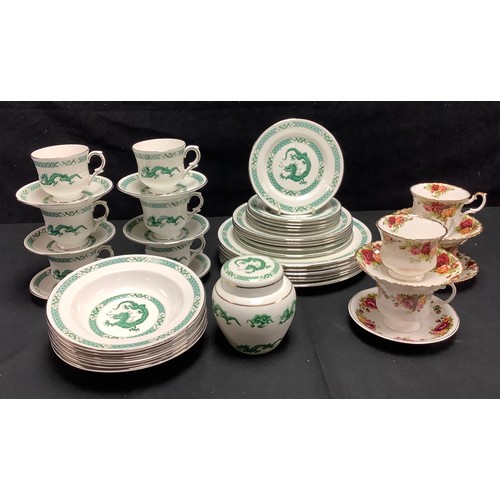 108 - A Royal Sutherland Dragon pattern dinner service; a small amount of Royal Albert Old Country Roses p... 