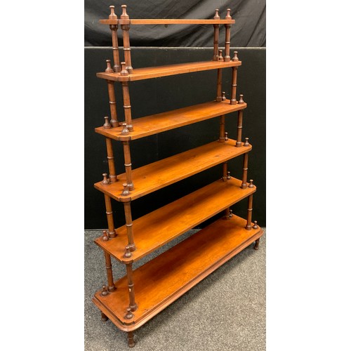 125 - A Victorian mahogany Waterfall Bookcase / What-not, six graduated tiers, turned supports, 145cm high... 