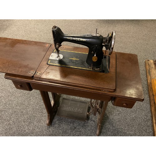 414 - An early 20th century Singer treadle sewing machine, number EB924703.