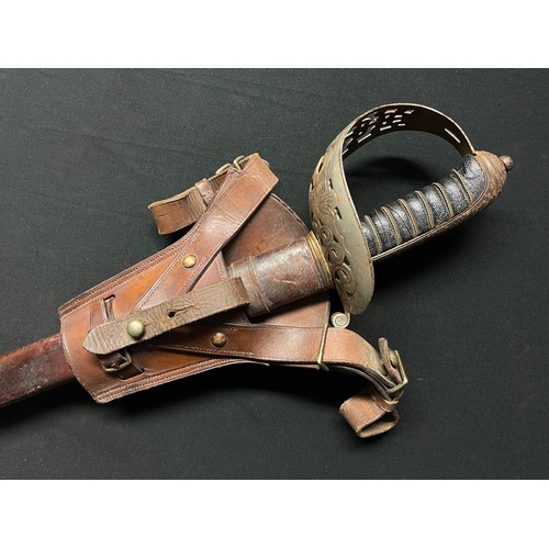 4049 - Victorian British Heavy Cavalry Officers Sword and Sam Brown Belt. Sword has decorated etched single... 