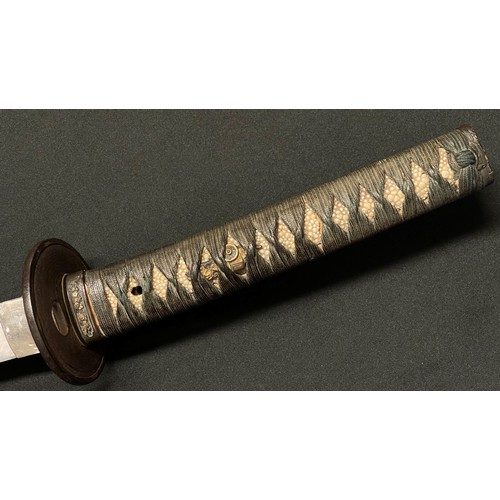 4064 - Japanese Katana Sword with single edged blade 630mm in length. Hamon line is visable. Tang is signed... 