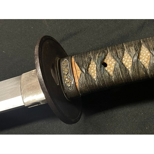 4064 - Japanese Katana Sword with single edged blade 630mm in length. Hamon line is visable. Tang is signed... 