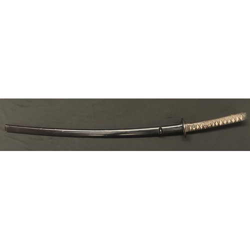 4064 - Japanese Katana Sword with single edged blade 630mm in length. Hamon line is visable. Tang is signed... 