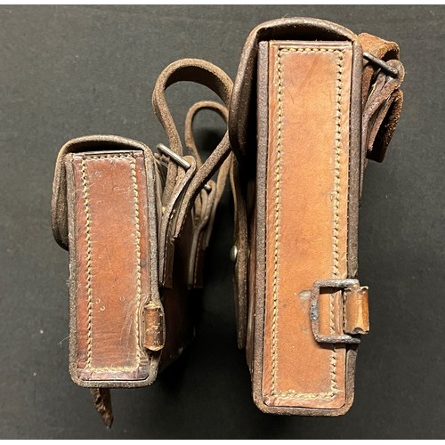 4080 - Pair of brown leather equipment pouches. Both are devoid of makers marks or dates. One sized 14.5cm ... 