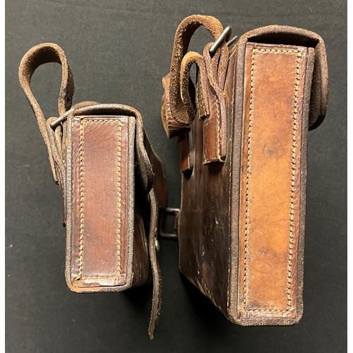 4080 - Pair of brown leather equipment pouches. Both are devoid of makers marks or dates. One sized 14.5cm ... 