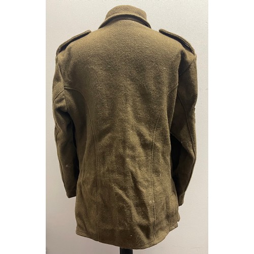 4103 - Reproduction WW1 British Service Dress Jacket and Trousers. Jacket has insignia for a Sgt in the Lin... 