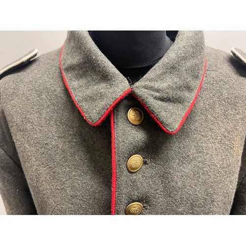 4125 - Reproduction WW1 Imperial German Cap, Tunic and Trousers. Tunic is red piped and comes with a reprod... 