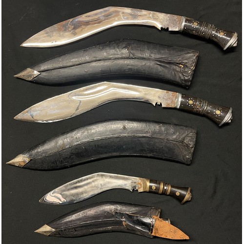 4186 - Three Kukri Knives all of the type brought home by British Servicemen as souvenirs. All with plated ... 