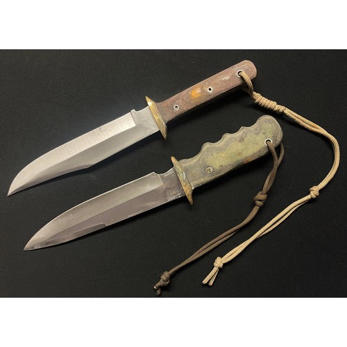 4268 - Two handmade and forged Bowie Knives: one with 200mm long blade and brass crossguard and straight wo... 