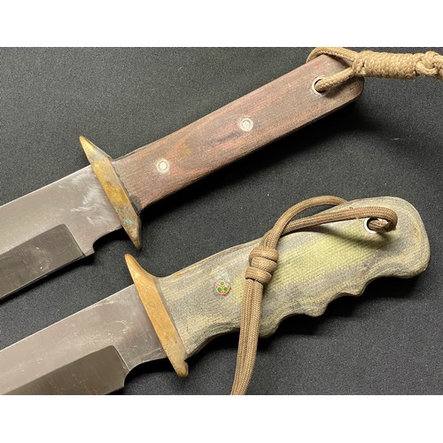 4268 - Two handmade and forged Bowie Knives: one with 200mm long blade and brass crossguard and straight wo... 