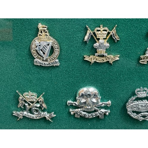 4291 - Framed collection of 20 British Cavalry & Armoured Regiments etc Staybrite Cap Badges. Frame size 49... 