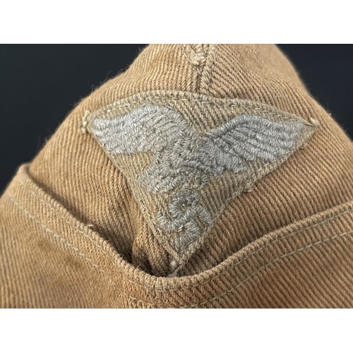 4364 - Reproduction Luftwaffe Tropical Cap with insignia. Maker marked 