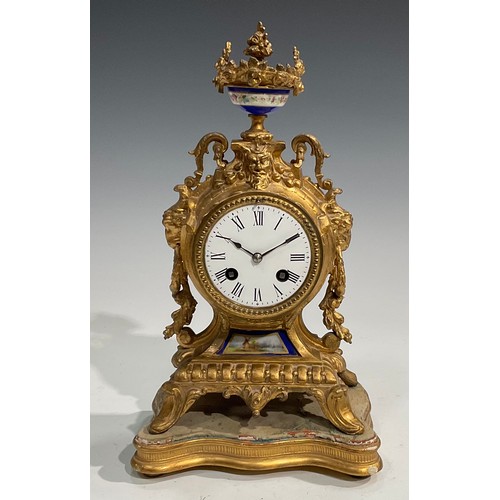 2433 - A late 19th century French gilt metal mantel clock, the movement stamped HP & Co, 7.5cm circular dia... 