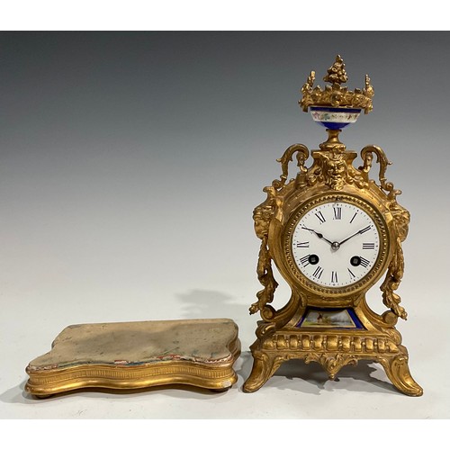 2433 - A late 19th century French gilt metal mantel clock, the movement stamped HP & Co, 7.5cm circular dia... 