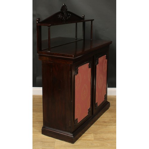 2513 - An early Victorian rosewood chiffonier, shaped superstructure with rectangular mirror, the base with... 