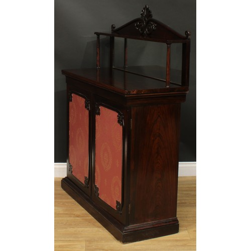 2513 - An early Victorian rosewood chiffonier, shaped superstructure with rectangular mirror, the base with... 