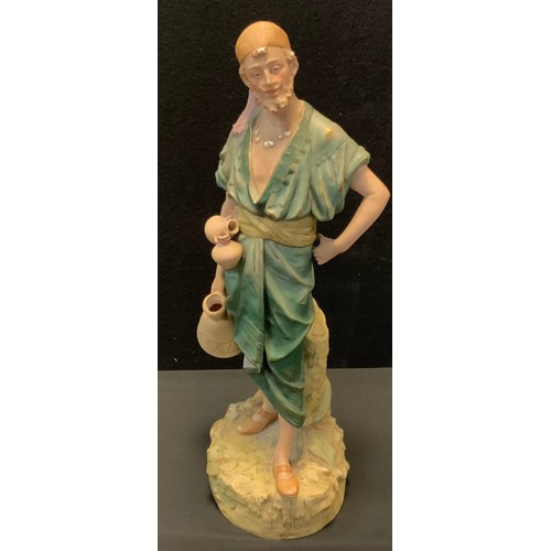 8 - A Royal Dux figure, The water carrier, stamped no 1074, pink triangle mark, 50cm high.