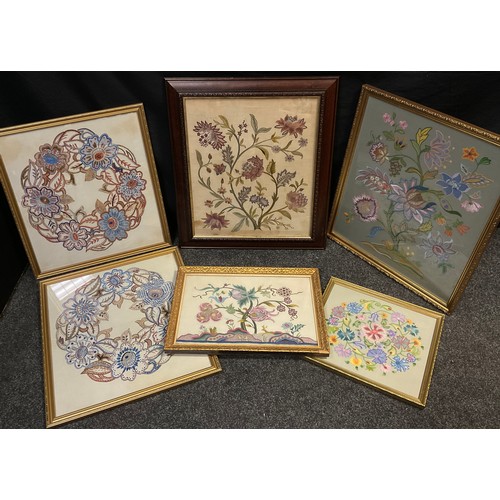 27 - A late 19th century Crewel embroidery panel, worked with scrolling stems and stylised flowers, 50.5c... 