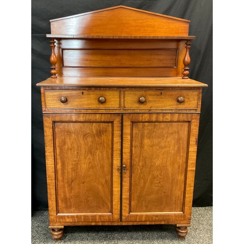 35 - A Victorian mahogany Chiffonier, pointed gallery back, two frieze drawers over pair of panelled cupb... 