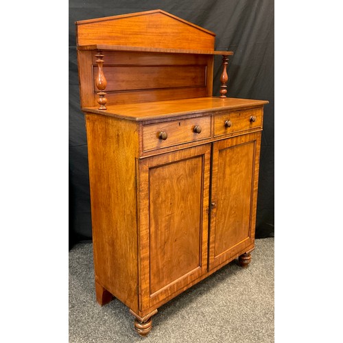 35 - A Victorian mahogany Chiffonier, pointed gallery back, two frieze drawers over pair of panelled cupb... 