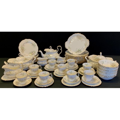 75 - A Royal Albert pattern ‘Haworth’ part table service comprised of; a tea pot nine tea tea cups and sa... 