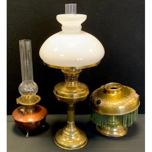 94 - A Victorian copper and brass oil lamp;  others brass, one with milk glass shade, 54cm high and small... 