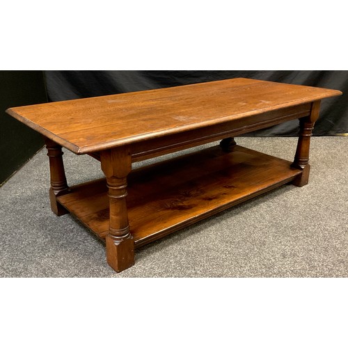 99 - A Titchmarsh and Goodwin oak coffee table, model RL22057, 45cm high x 132.5cm x 61.5cm.