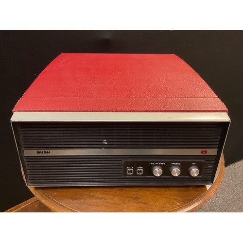 105 - A Vintage Bush RP60 turntable record player, red leatherette case;  an E. Gomme G-Plan corner occasi... 