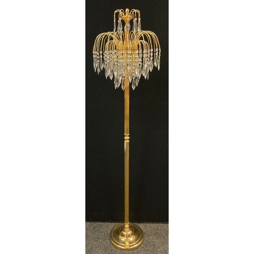 108 - A contemporary chandelier-top standard lamp, reeded brass upright, circular base 160cm high.