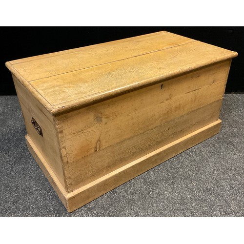 112 - An early 20th century carpenter’s pine tool chest, 47cm high x 91.5cm wide x 50cm.