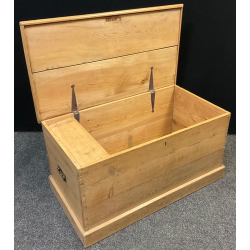 112 - An early 20th century carpenter’s pine tool chest, 47cm high x 91.5cm wide x 50cm.