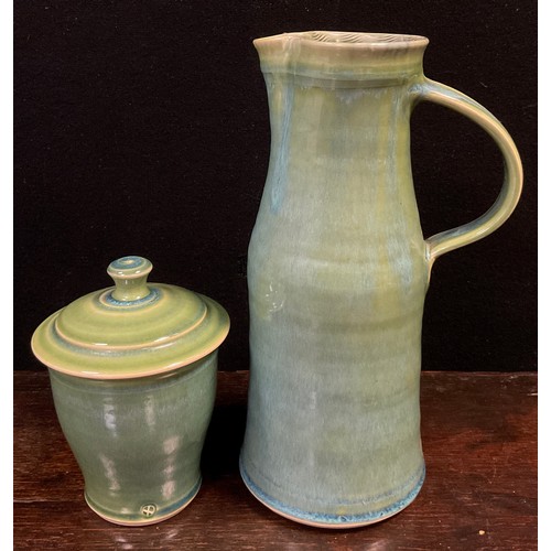 154 - Studio pottery - A Geoffrey Whiting tall stoneware ewer, celadon type glaze, 28cm high, potter’s mar... 