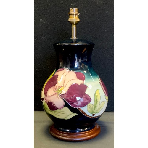 161 - A Moorcroft 'wine magnolia' vase ovoid lamp, decorated with tube lined flowers and foliage, c.1992, ... 