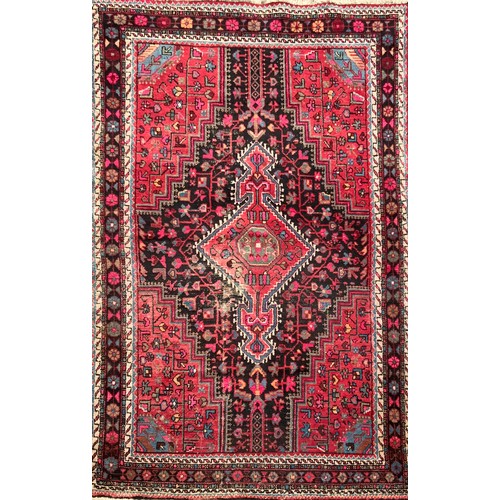 162 - A Persian hand knotted Mousel Carpet, central geometric medallion within floral ground, in tones of ... 