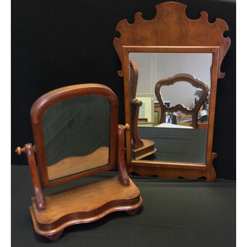 168 - Mirrors - A reproduction of a Vauxhall mirror, 72 x 36cm; a standing toilet mirror (2)